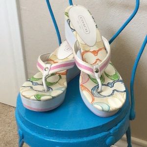 Coach platform flip flops